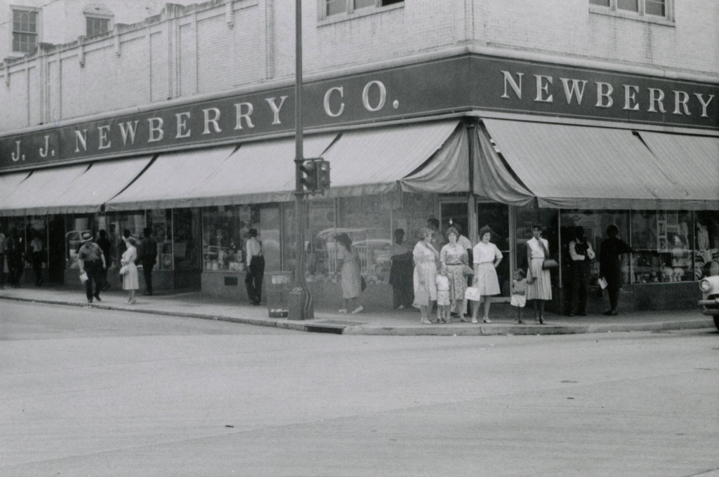 People standing outside of JJ Newberry in Farmville, 1963.